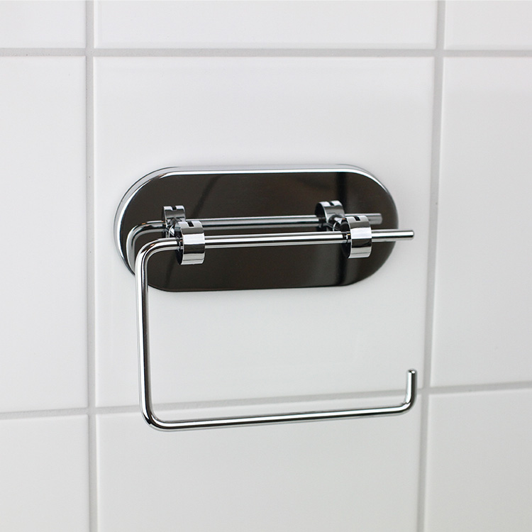 Toalettpappershållare med sugpropp