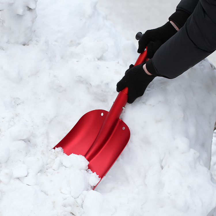 Hopfällbar snöskyffel