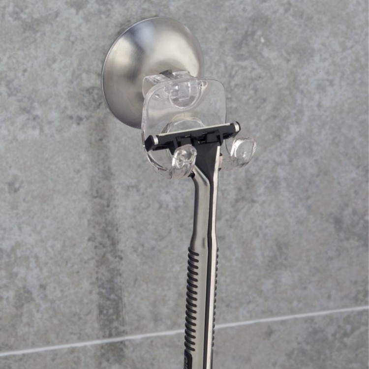 Rakhyvelshållare med sugpropp