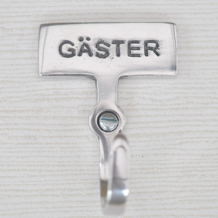 Krok med skylt, GÄSTER, Exmez, Sandgjuten aluminium