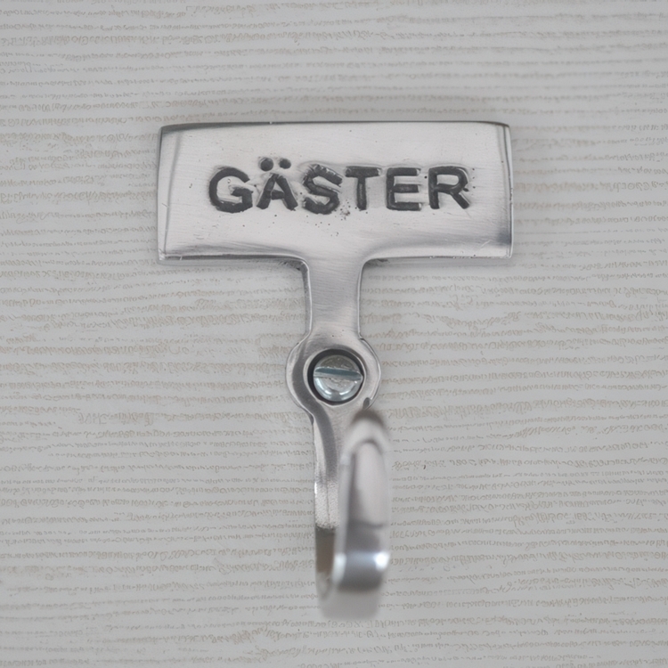 Krok med skylt, GÄSTER, Exmez, Sandgjuten aluminium