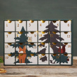 Adventskalenderhus i trä Adventskalenderhus i trä