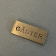 Skylt , GÄSTER, 5 x 2 cm, Exmez, Borstad Mässing Skylt , GÄSTER, 5 x 2 cm, Exmez, Borstad Mässing