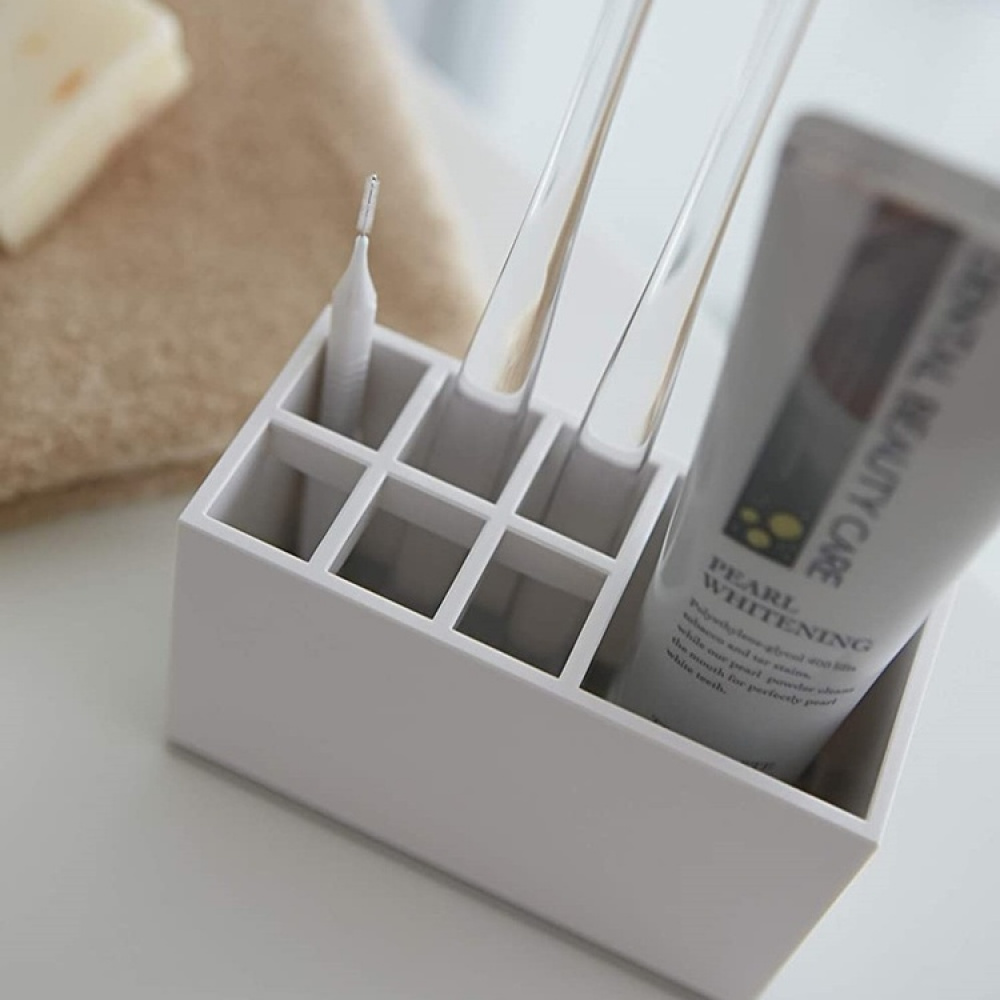 Tandborsthållare med plats för tandkräm, YAMAZAKI MIST, 11 x 5 x H 7 cm, Vit i gruppen Förvaring / Badrumsförvaring hos SmartaSaker.se (42924)